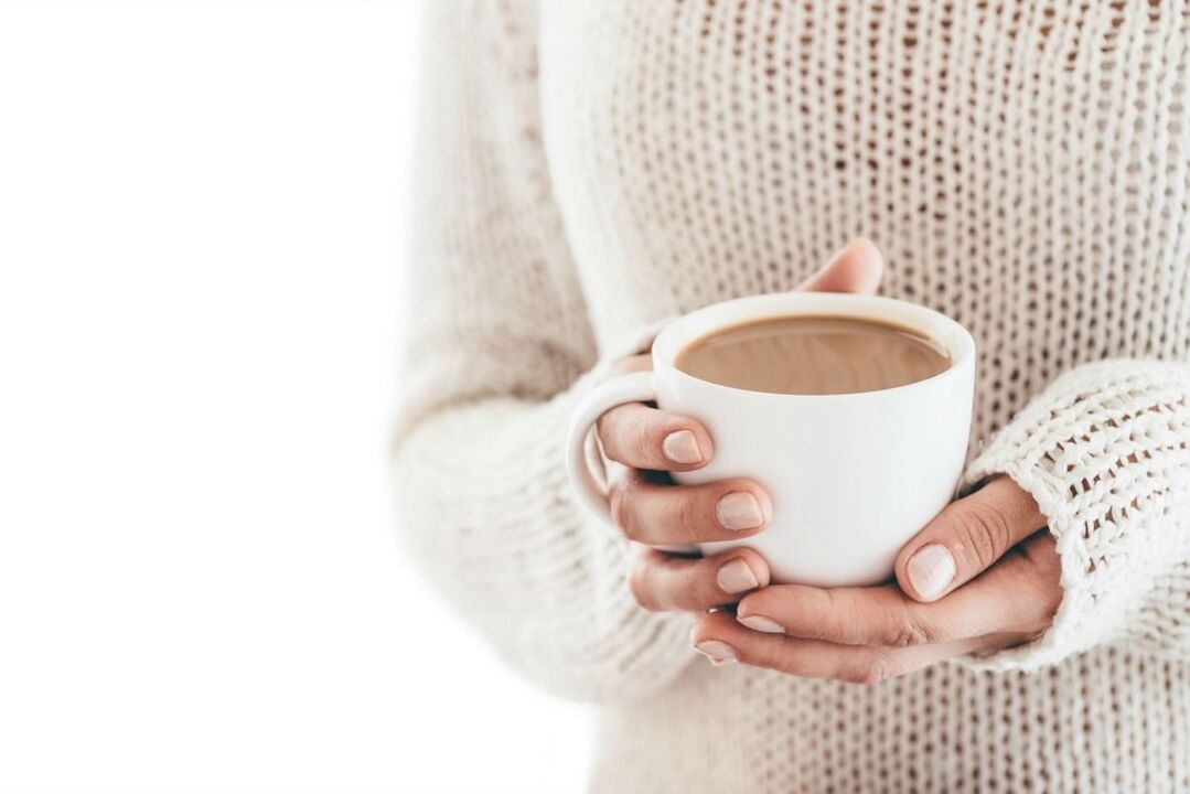 A glass with losing keto coffee